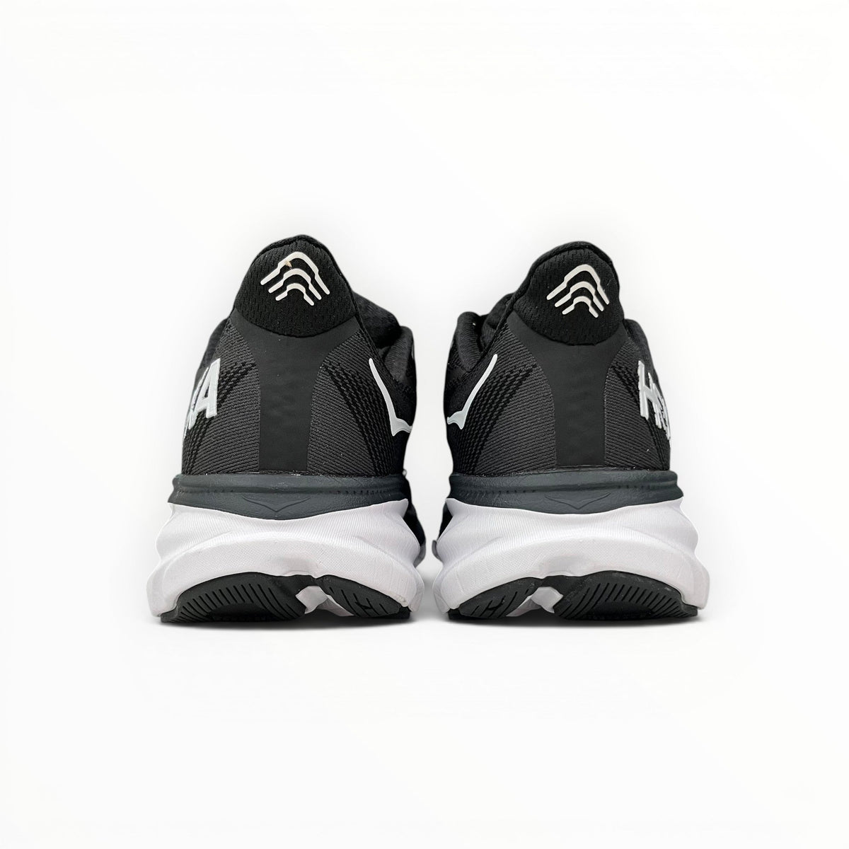 Hoka Clifton 9 men's running shoes in Black/White – rear view