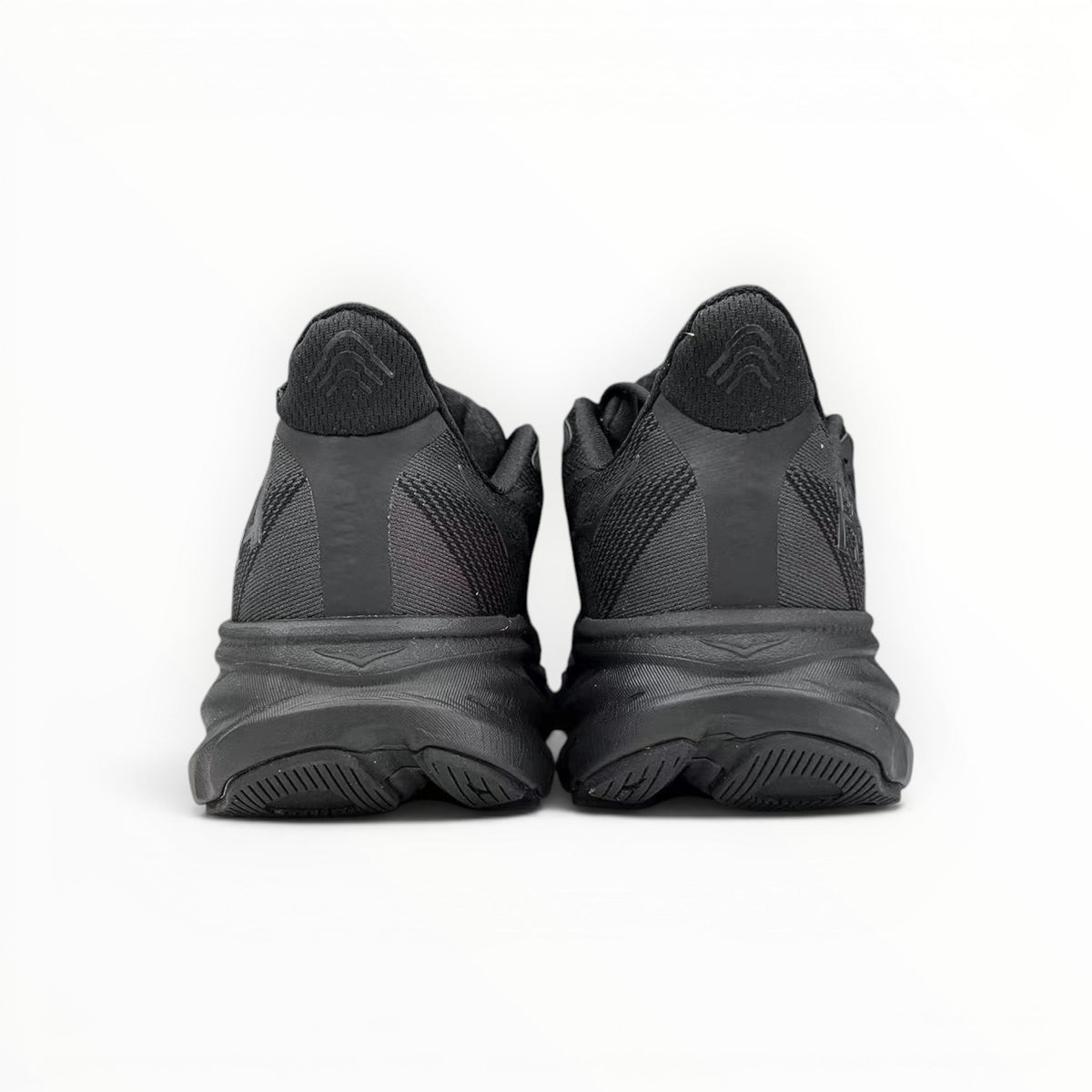 Hoka Clifton 9 women's running shoes in Black/Black – rear view