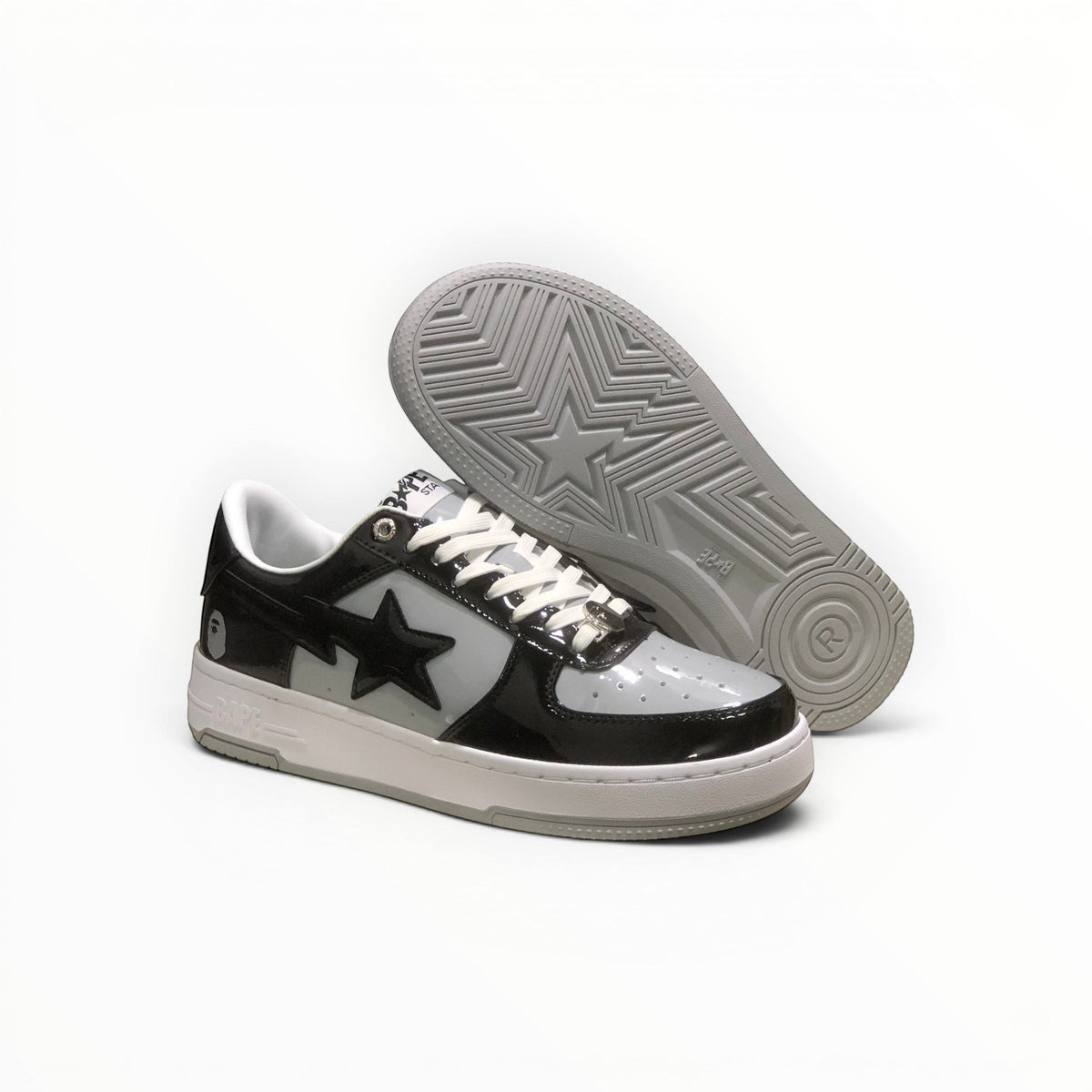 A Bathing Ape BAPE STA women's low-top sneakers in Black/Grey/White, outsole view