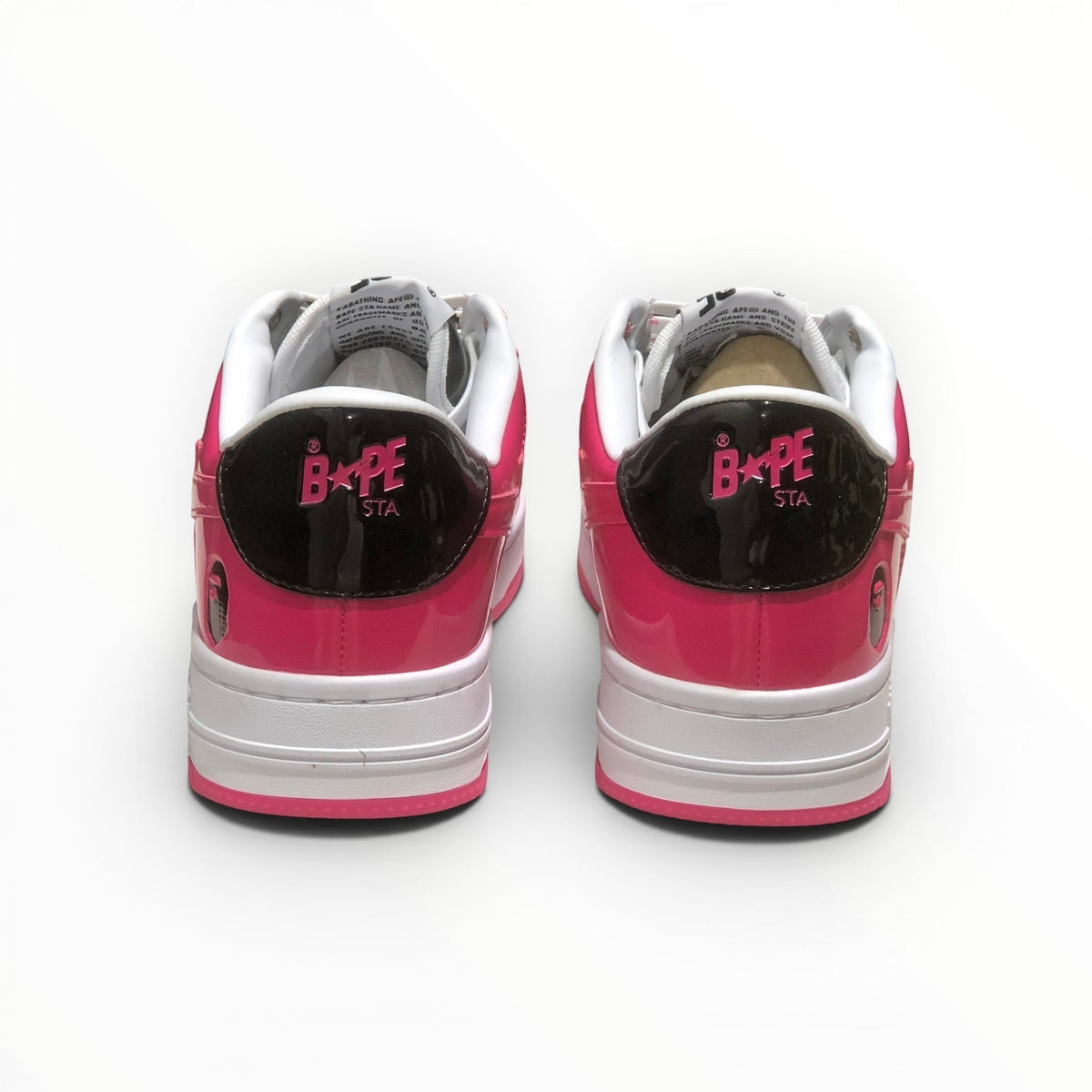 A Bathing Ape BAPE STA women's low-top sneakers in Pink/Black, rear heel view