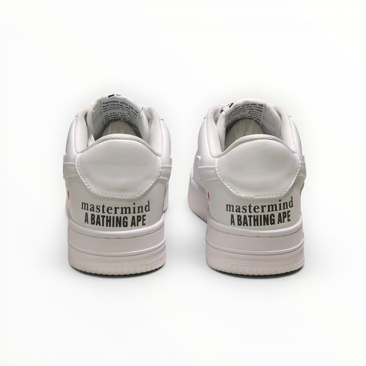 A Bathing Ape BAPE STA men's low-top sneakers in Triple White, rear heel view