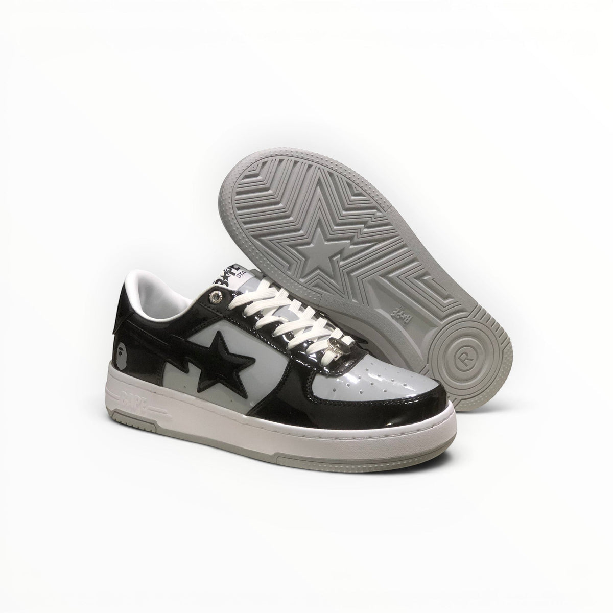 A Bathing Ape BAPE STA men's low-top sneakers in Black/Grey/White, outsole view