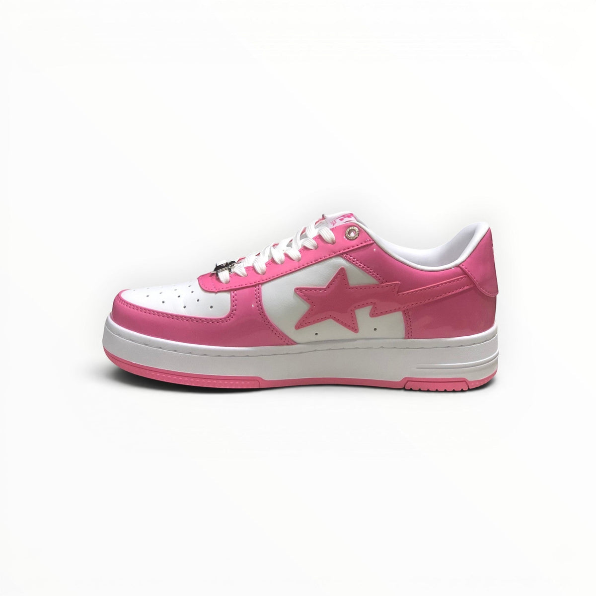 A Bathing Ape BAPE STA men's low-top sneakers in Pink/White, side view