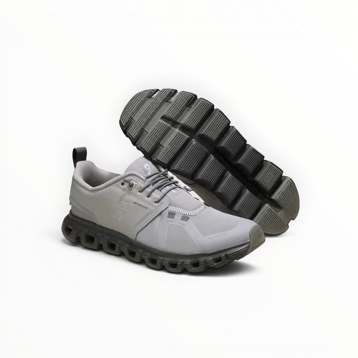 On Cloud 6 Waterproof men's shoe in Zinc/Canyon, three-quarter view