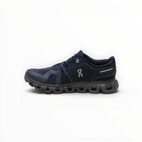 On Cloud 6 Waterproof women's lifestyle shoe in Navy/Black, three-quarter view