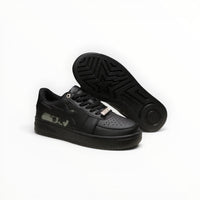 A Bathing Ape BAPE STA women's low-top sneakers in Triple Black, outsole view