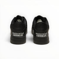 A Bathing Ape BAPE STA women's low-top sneakers in Triple Black, rear heel view