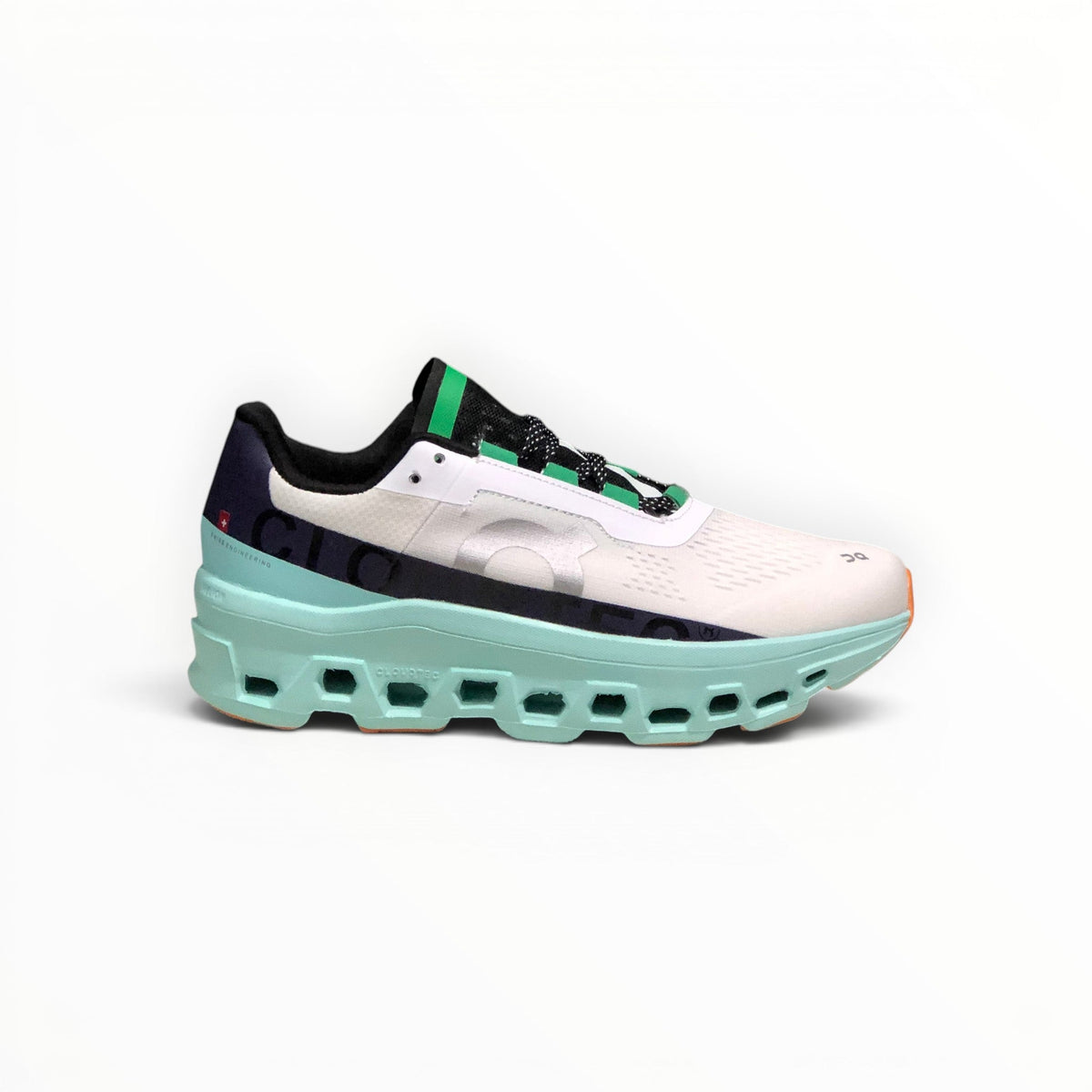 On Cloudmonster women's shoe in Black/Acacia - product view 1