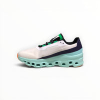 On Cloudmonster women's shoe in Black/Acacia - product view 2