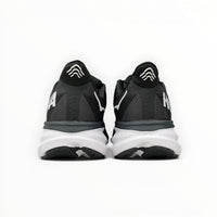 Hoka Clifton 9 women's running shoes in Black/White – rear view