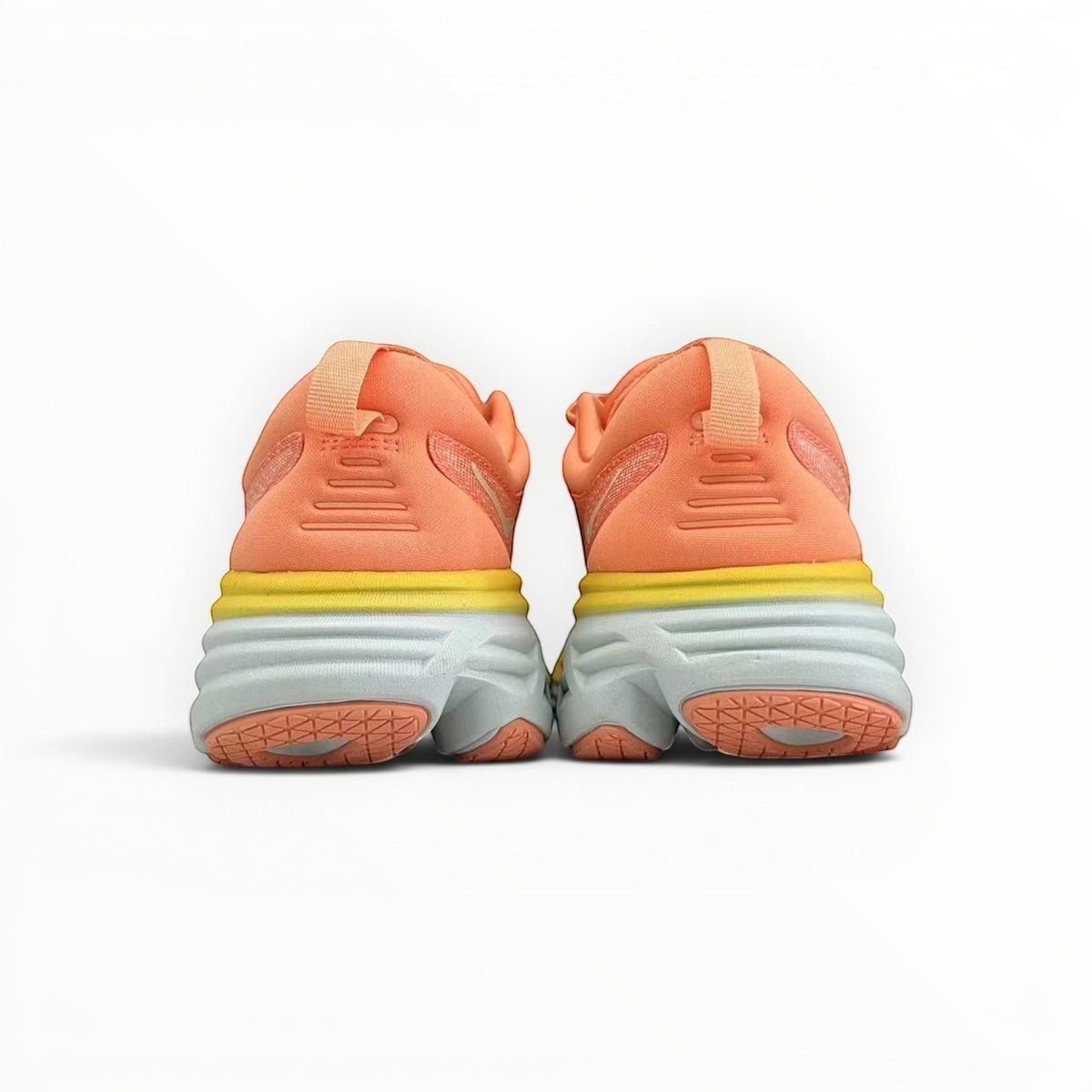 Hoka Bondi 8 women's running shoe in Shell Coral/Peach Parfait, three-quarter view