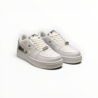 A Bathing Ape BAPE STA women's low-top sneakers in Triple White, side view