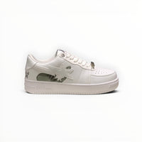 A Bathing Ape BAPE STA women's low-top sneakers in Triple White, side view