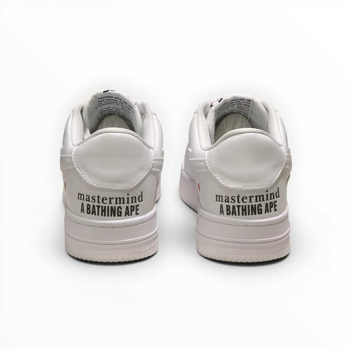 A Bathing Ape BAPE STA women's low-top sneakers in Triple White, rear heel view