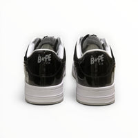 A Bathing Ape BAPE STA women's low-top sneakers in Black/Grey/White, rear heel view