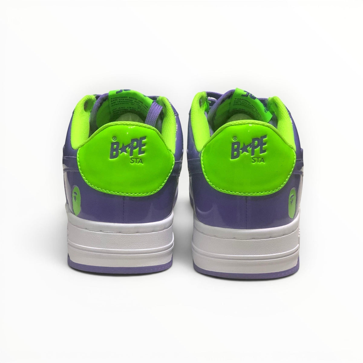A Bathing Ape BAPE STA women's low-top sneakers in Green/Purple, rear heel view