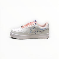 A Bathing Ape BAPE STA women's low-top sneakers in White/Peach, side view