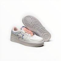 A Bathing Ape BAPE STA women's low-top sneakers in White/Peach, outsole view