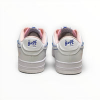 A Bathing Ape BAPE STA women's low-top sneakers in White/Peach, rear heel view