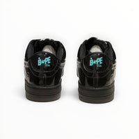 A Bathing Ape BAPE STA women's low-top sneakers in Black Patent/Silver, rear heel view
