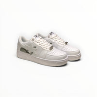 A Bathing Ape BAPE STA men's low-top sneakers in Triple White, product view 1