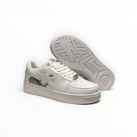 A Bathing Ape BAPE STA men's low-top sneakers in Triple White, outsole view
