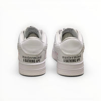 A Bathing Ape BAPE STA men's low-top sneakers in Triple White, rear heel view