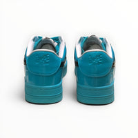 A Bathing Ape BAPE STA men's low-top sneakers in Blue/Black, rear heel view