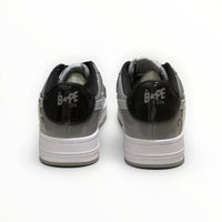 A Bathing Ape BAPE STA men's low-top sneakers in Grey/Black, rear heel view