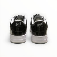 A Bathing Ape BAPE STA men's low-top sneakers in Black/Grey/White, rear heel view