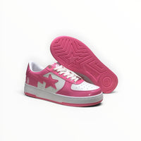 A Bathing Ape BAPE STA men's low-top sneakers in Pink/White, outsole view
