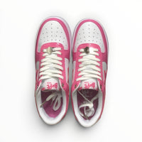 A Bathing Ape BAPE STA men's low-top sneakers in Pink/White, side view
