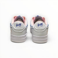 A Bathing Ape BAPE STA men's low-top sneakers in White/Peach, rear heel view