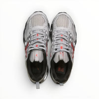 WSS Sports Shoes Mizuno Wave Prophecy 14S men's running shoes in white and red with breathable mesh and Infinity Wave plate.