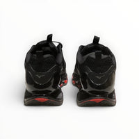 WSS Sports Shoes Mizuno Wave Prophecy 14S triple black running shoes showing the rear view of the Infinity Wave plate.