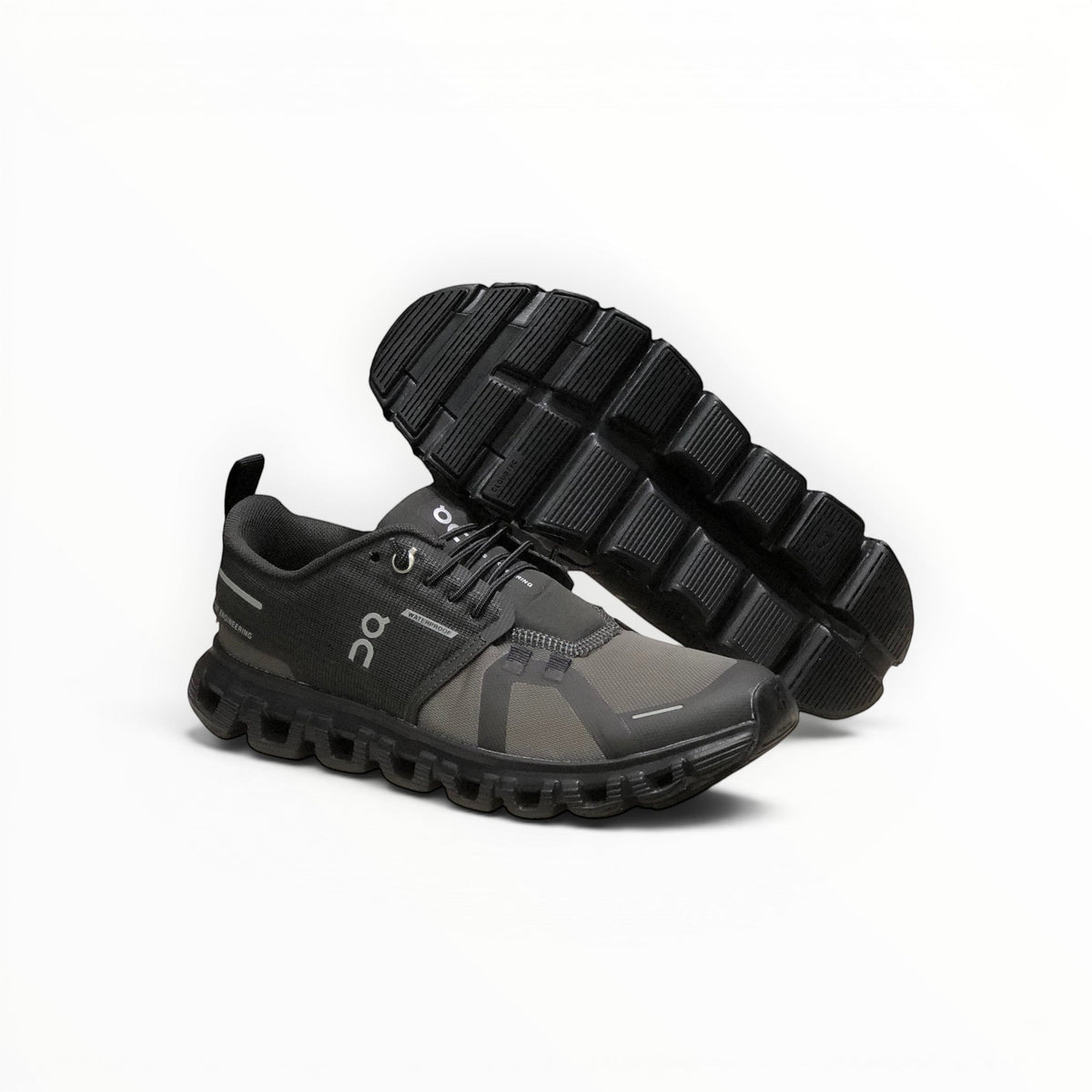On Cloud 6 Waterproof men's lifestyle shoe in Black/Grey, three-quarter view