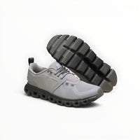 On Cloud 6 Waterproof men's shoe in Zinc/Canyon, three-quarter view