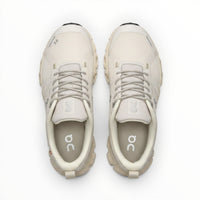 On Cloud 6 Waterproof men's lifestyle shoe in Cream/Sand, three-quarter view