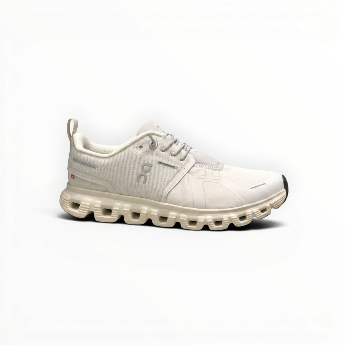 On Cloud 6 Waterproof men's lifestyle shoe in Cream/Sand, outsole view